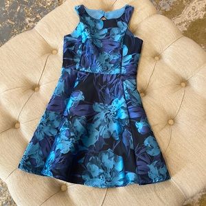 Zunie Girls Blue Floral designed “A” line dress, zippered back w/diamond cut out